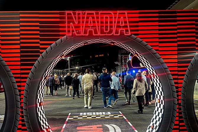 Red and Black race car inspired entrance to the outdoor area of the NADA Convention